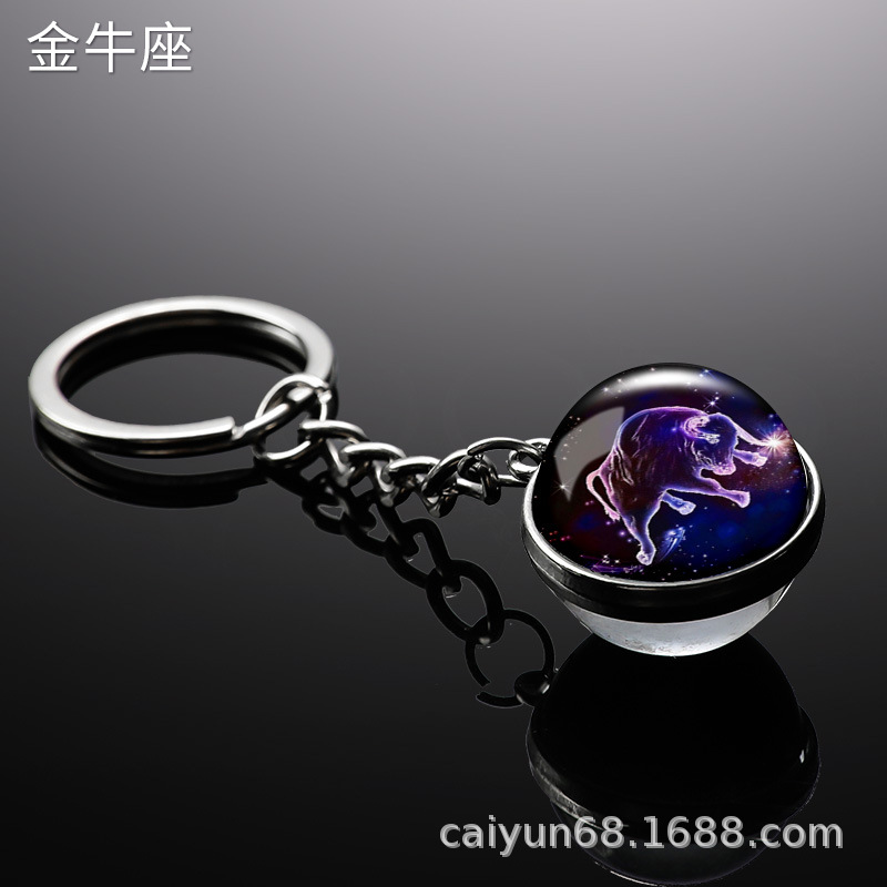 Transfronterizo 12 constelaciones de luz nocturna bolsos colgantes de bolsas de joyas de tiempo doble cara bola de vidrio llavero al por mayor