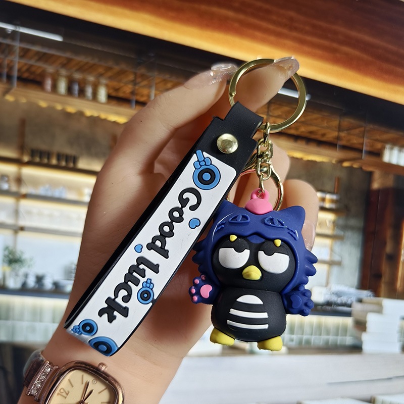 Perro de orejas grandes Melody KT gato pudín perro Kolomi caricatura de silicona llavero colgante bolsa colgante caja ciega regalo