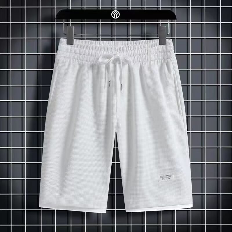 Camisa menos ropa Waffle pantalones de cinco puntos para hombres verano nuevo estilo estilo Hong Kong pantalones cortos de dos piezas falsos de color recto suelto