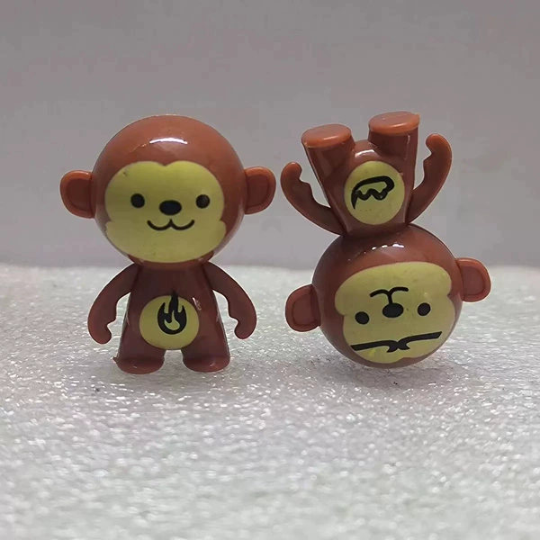 Roly-poly doll, monkey