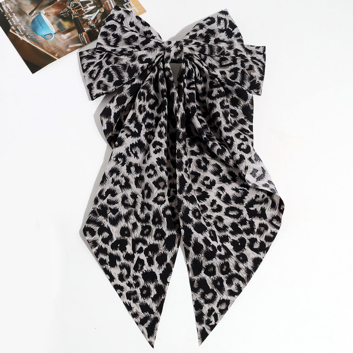 Estilo de moda europeo y americano personalidad nicho de diseño arco leopardo aro de pelo clip de resorte retrógrado anillo para el pelo accesorios para el pelo