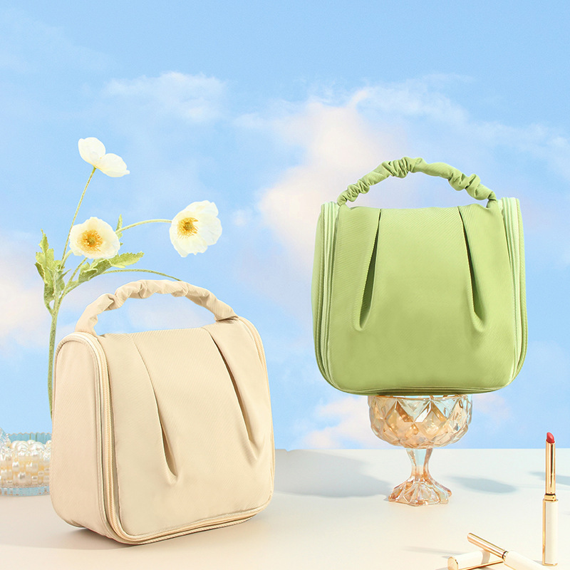 Otoño e Invierno nuevo plisado portátil perla cremallera colgando artículos de tocador almacenamiento viaje maquillaje acabado bolsa