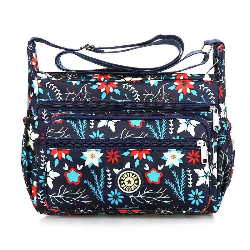 Bolsa de tela de flores bolsa de mensajero de las mujeres nueva bolsa de Madre de gran capacidad bolsa de hombro individual de mediana edad y ancianos bolsa de tela Oxford bolsa