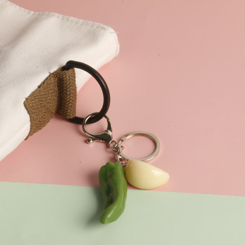 Simulación en stock llavero de ajo creativo anti-perdido llavero de coche estudiante mochila colgante Chili food and play fabricante