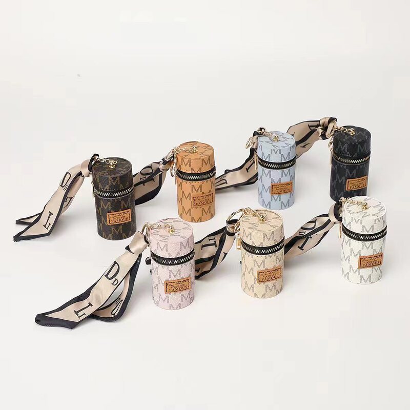 European and American presbyopic coin purse retro mini bucket bag cute key chain earphone bag mouth red envelope car key chain European and American presbyopic coin purse retro mini bucket bag cute key chain earphone bag mouth red envelope car key chain