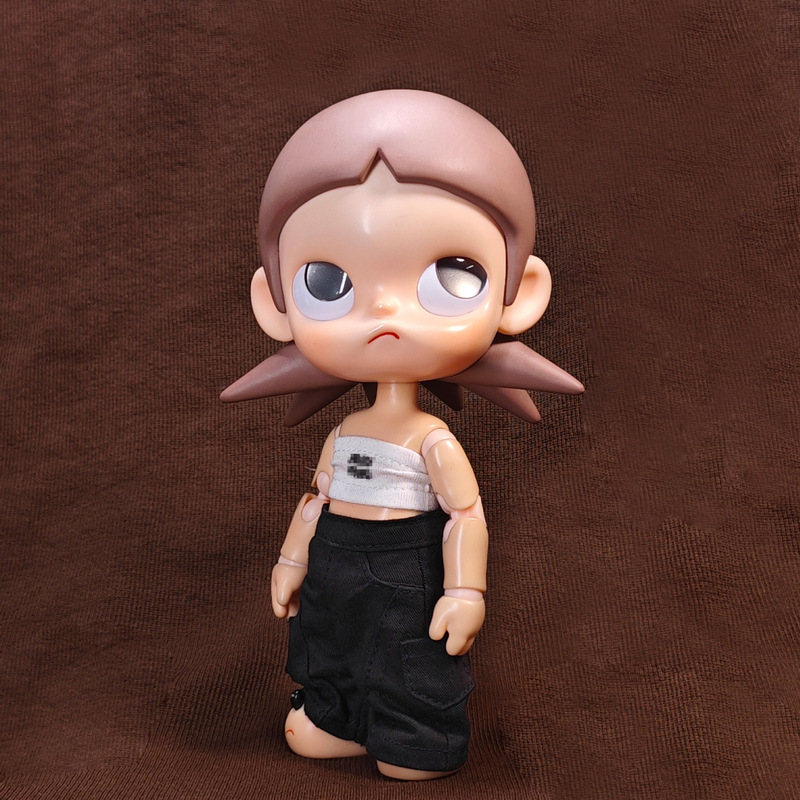 Gazi Jie Zsiga's Dream Place Movable Doll with a Vest and Interchangeable Outfits Gazi Jie Zsiga's Dream Place Movable Doll with a Vest and Interchangeable Outfits