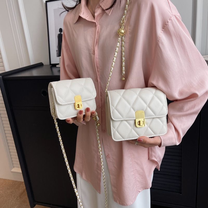Sentido diario mini bolso para mujeres 2026 primavera y verano nuevo bolso cuadrado de cadena de diamante de moda versátil mochila de hombro
