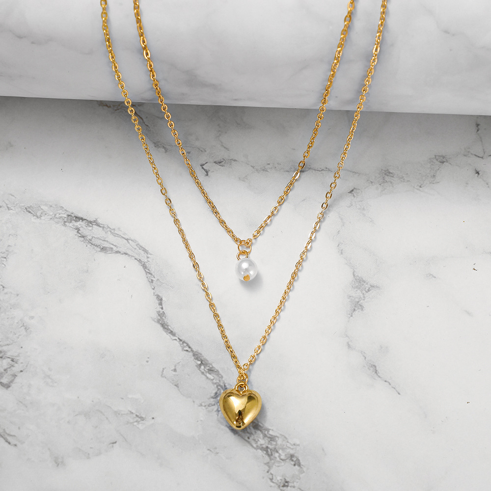Collier cœur en perles multicouches, style européen et américain, collection 2021 : bijoux féminins simples, rétro et créatifs, inspirés des styles européen et américain._voghion.com