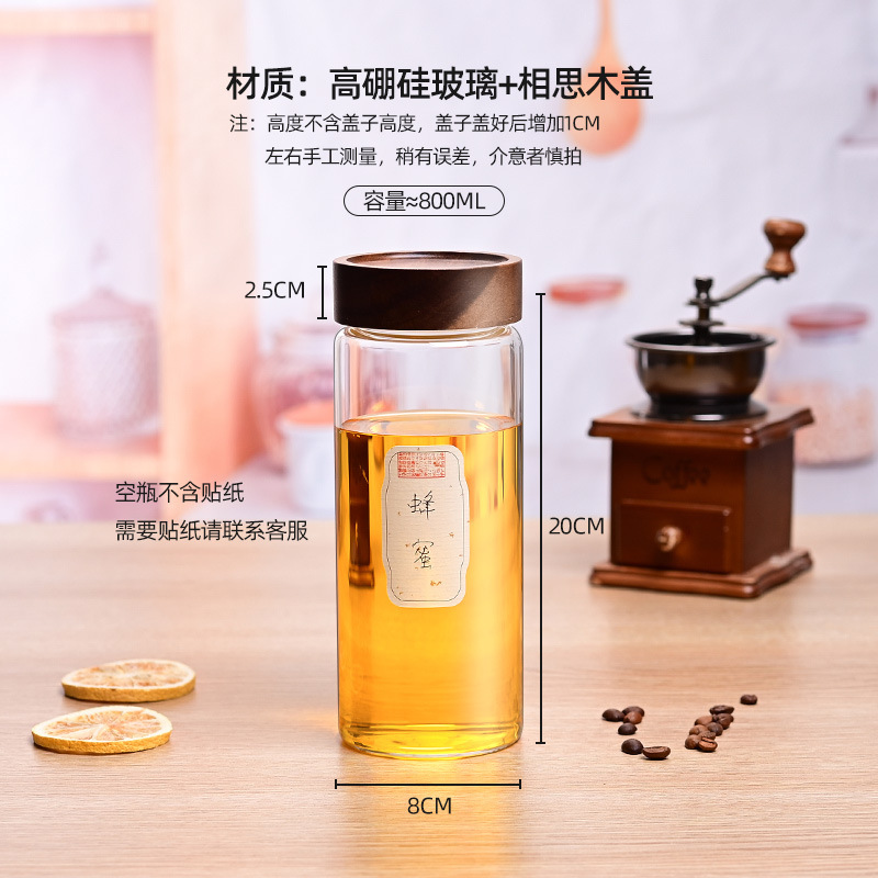 蜂蜜を入れて瓶を分けて専用の食品級の高ホウ素シリコンを詰めて缶を密封します。|undefined
