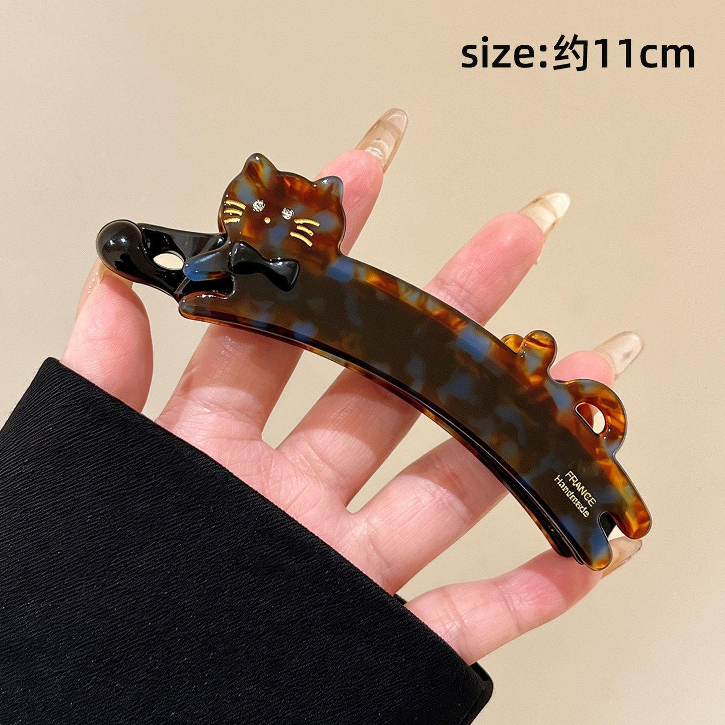 3# cat banana clip - golden brown leopard print, approximately 10.5cm
