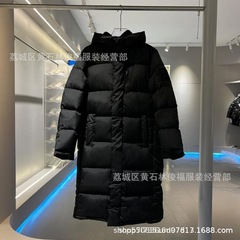 冬の莆田超長のダウンジャケット申敏児と同じ男女のカップルのパン服ジャケットが湿っている