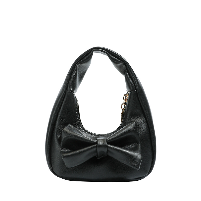Dolce y lindo arco bolso de niña exquisita mini bolso de cambio de bebé 2025 bolso infantil transfronterizo