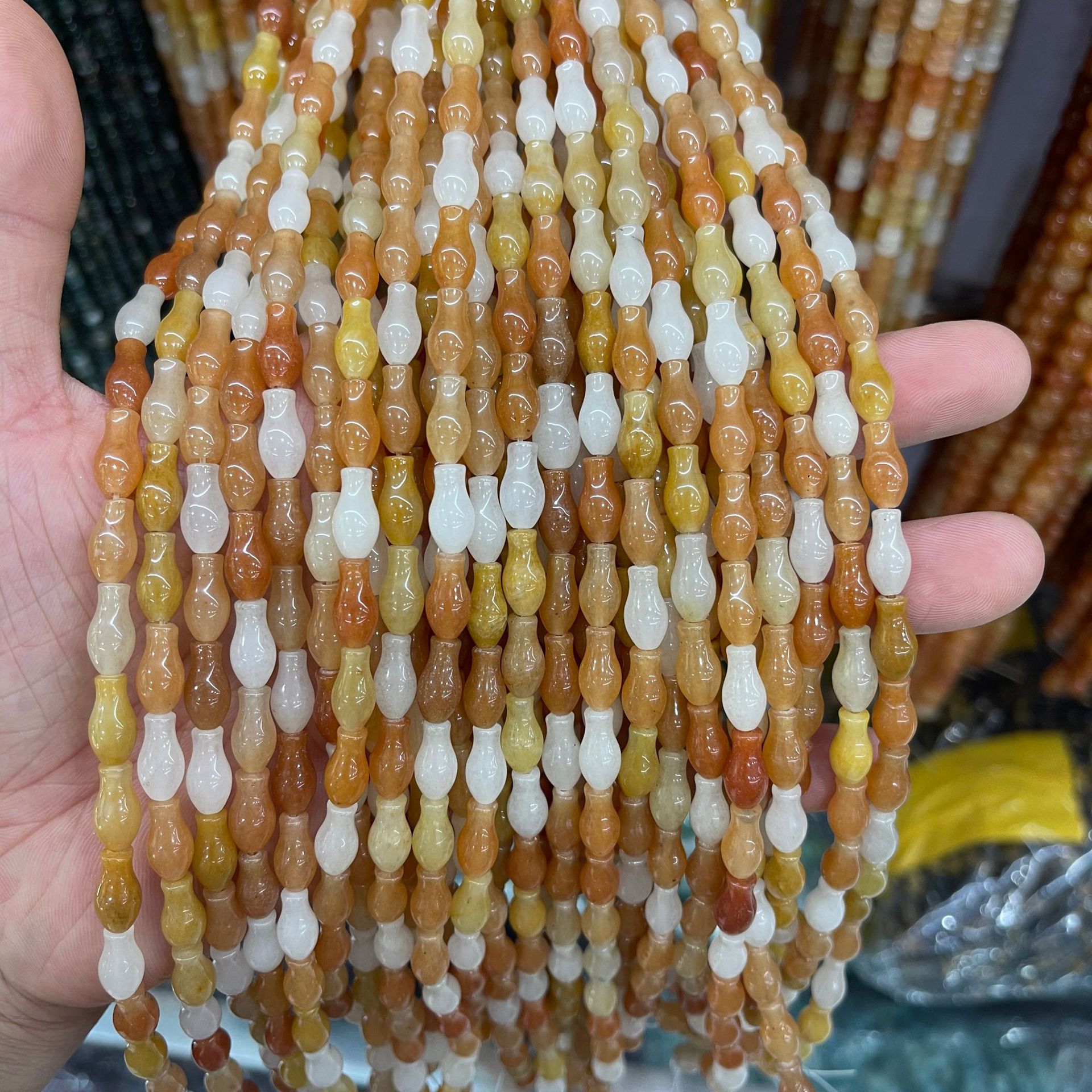 金丝玉花瓶 6x12m 32颗 价格12 重量20.JPG