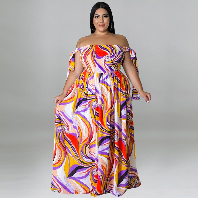 Maxi jurk met spaghettibandjes en smockwerk en strikprint_voghion.com