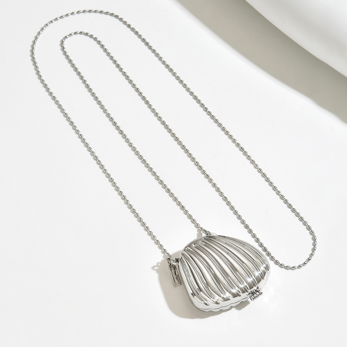 Nuevo suéter accesorios collar de doble propósito Jin Huiyun conchas collar de bolsas de larga inclinación colgante para mujeres