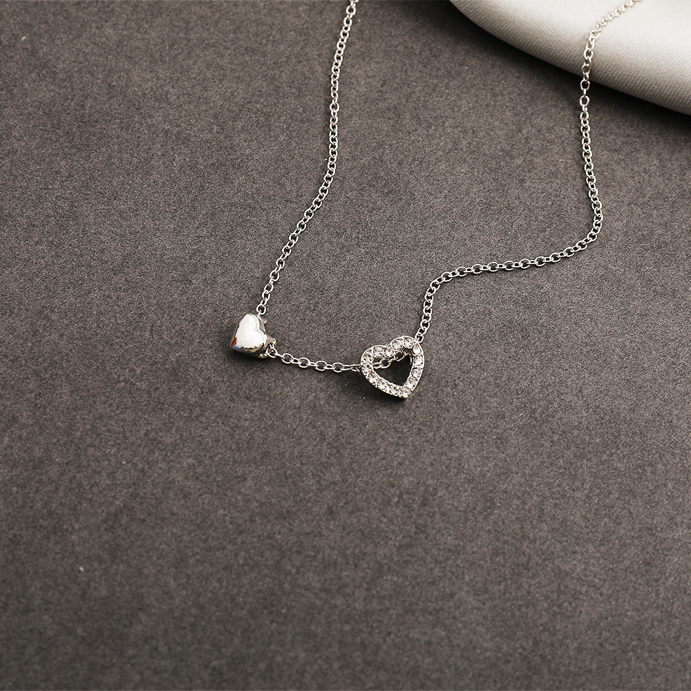 New Heart Pendant Clavicle Chain Creative Simple Trendy Hollow Peach Heart Necklace Wholesale display picture 14