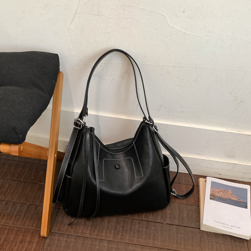 Una bolsa multipropósito de gran capacidad para mujeres 2026 nueva moda simple mochila de hombro de viaje bolsa de ocio
