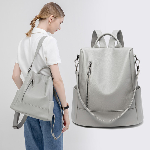 Anti-theft backpack women's Korean version simple  summer new backpack large capacity soft leather bag casual shoulder multi-purpose