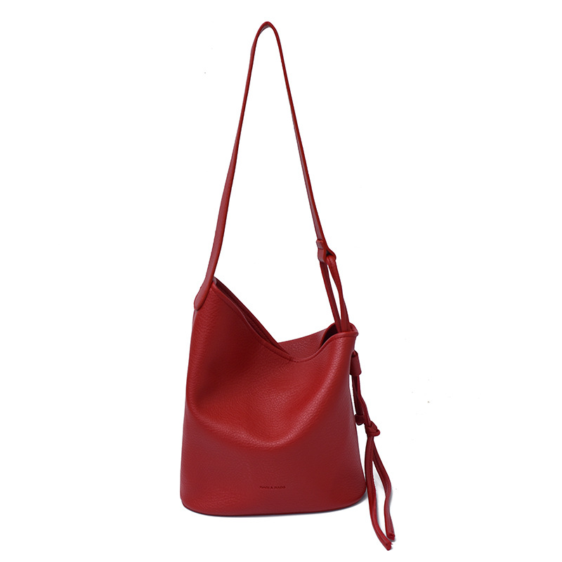 Bolso de cubo de textura transfronteriza 2025 verano nuevo bolso femenino estilo ins bolso de hombro simple