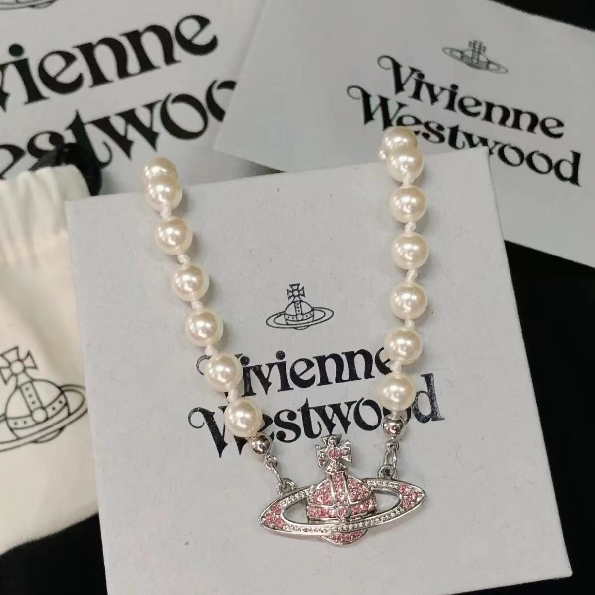 Saturn necklace silver [pink diamond]