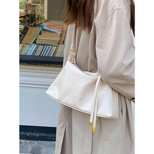 Modern rule tote bag 2024 new commuter texture bag female niche design soft shoulder messenger bag