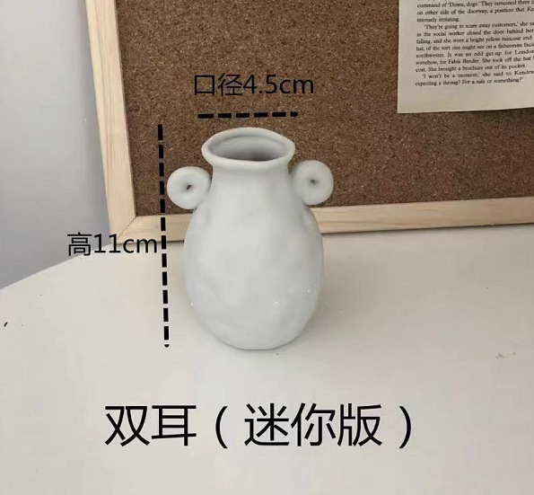 양쪽 귀의 미니 버전(회색 및 흰색)