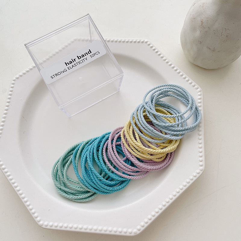 Temperamento simple cuerda de cabeza negra mujer correa de cabello de alta elasticidad duradera alta cola de caballo adornos de cabello anillo de cabello al por mayor