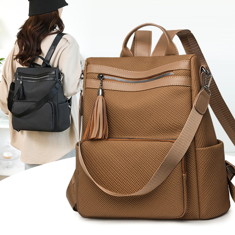 新款复古双肩包时尚百搭大容量防盗包休闲轻便通勤流苏背包女包