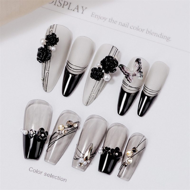 Internet celebridad nueva manicura blanco y negro Camellia perla joyería tridimensional mariposa oro bola de acero mezclado joyería de uñas