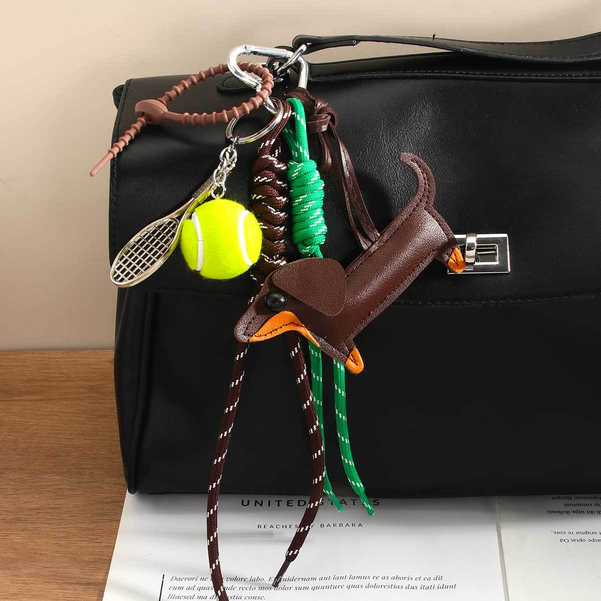 Miu retro PU dachshund dog pendant small book love tennis woven rope bag pendant key chain wholesale goods