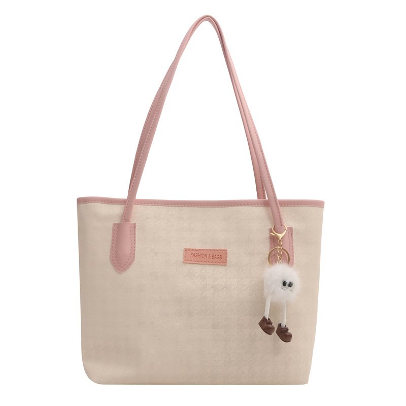 Bolso de mano de viaje al trabajo 2024 primavera nuevo bolso de ocio universal bolso de hombro brazo bolso de mano coreano