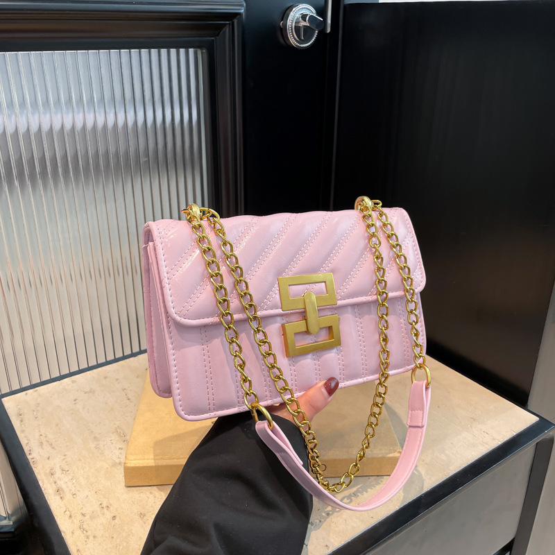 Bolso de hombro recubierto bordado retro 2025 nueva moda de color sólido popular cadena casual de moda bolso de mochila