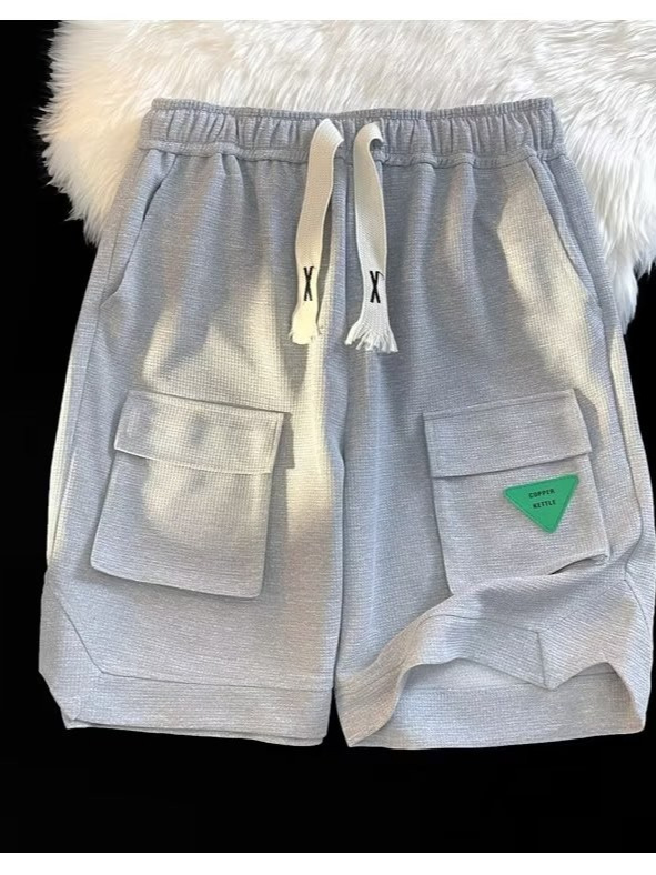 2024 Hong Kong viento coreano ins tendencia retro japonés todo fósforo suelto traje recto pantalones de cinco puntos pantalones casuales hombres de moda