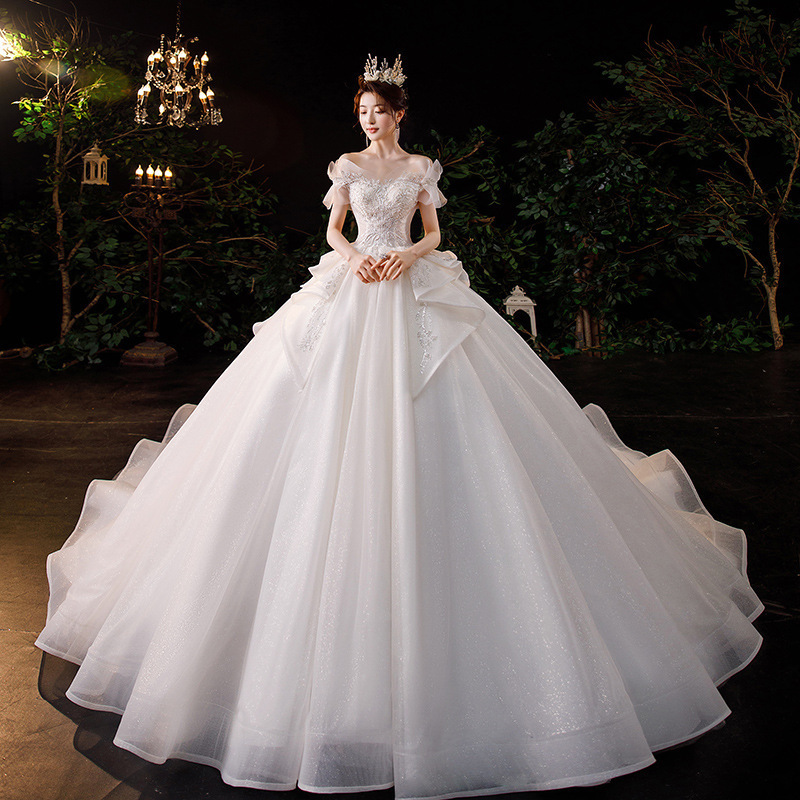 Vestido de novia estilo francés, nueva colección primavera 2026 para novias, vestido principal de hombros descubiertos, estilo princesa de palacio con cola larga, vestido de tul ligero. image 3