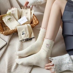 靴下の女性の秋冬のアイデアの糸の木の耳元は汗を吸います。