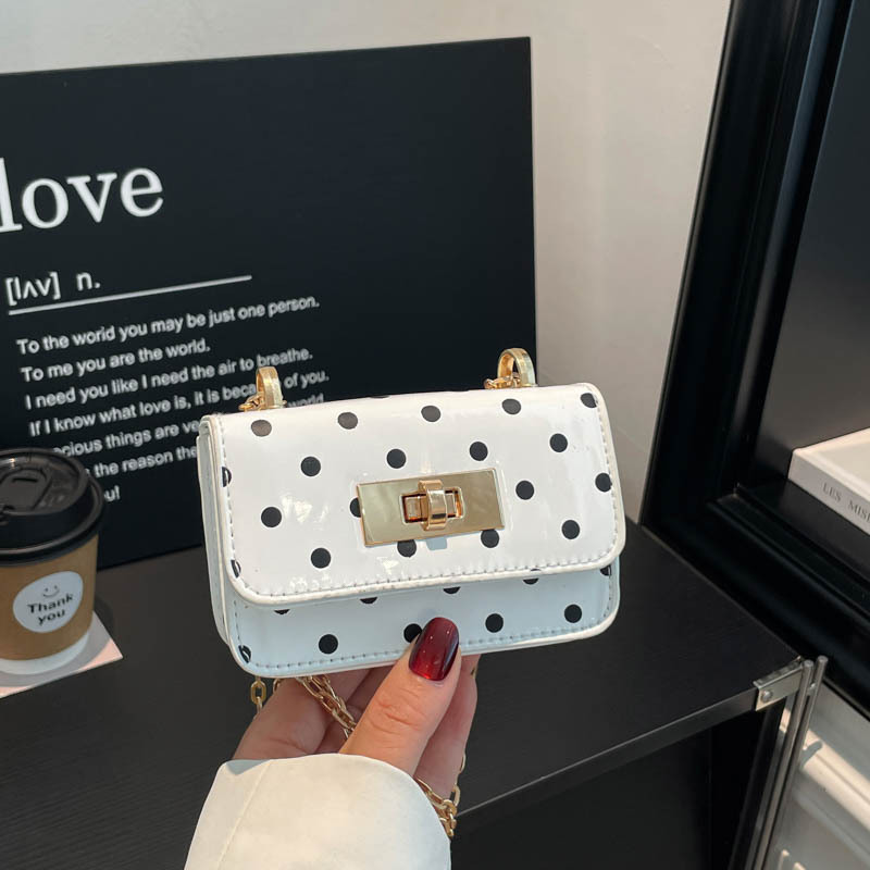 Trendy single-shoulder crossbody bag, polka dot small new model 2026, lock clasp bag for women, stylish and fashionable women's handbag