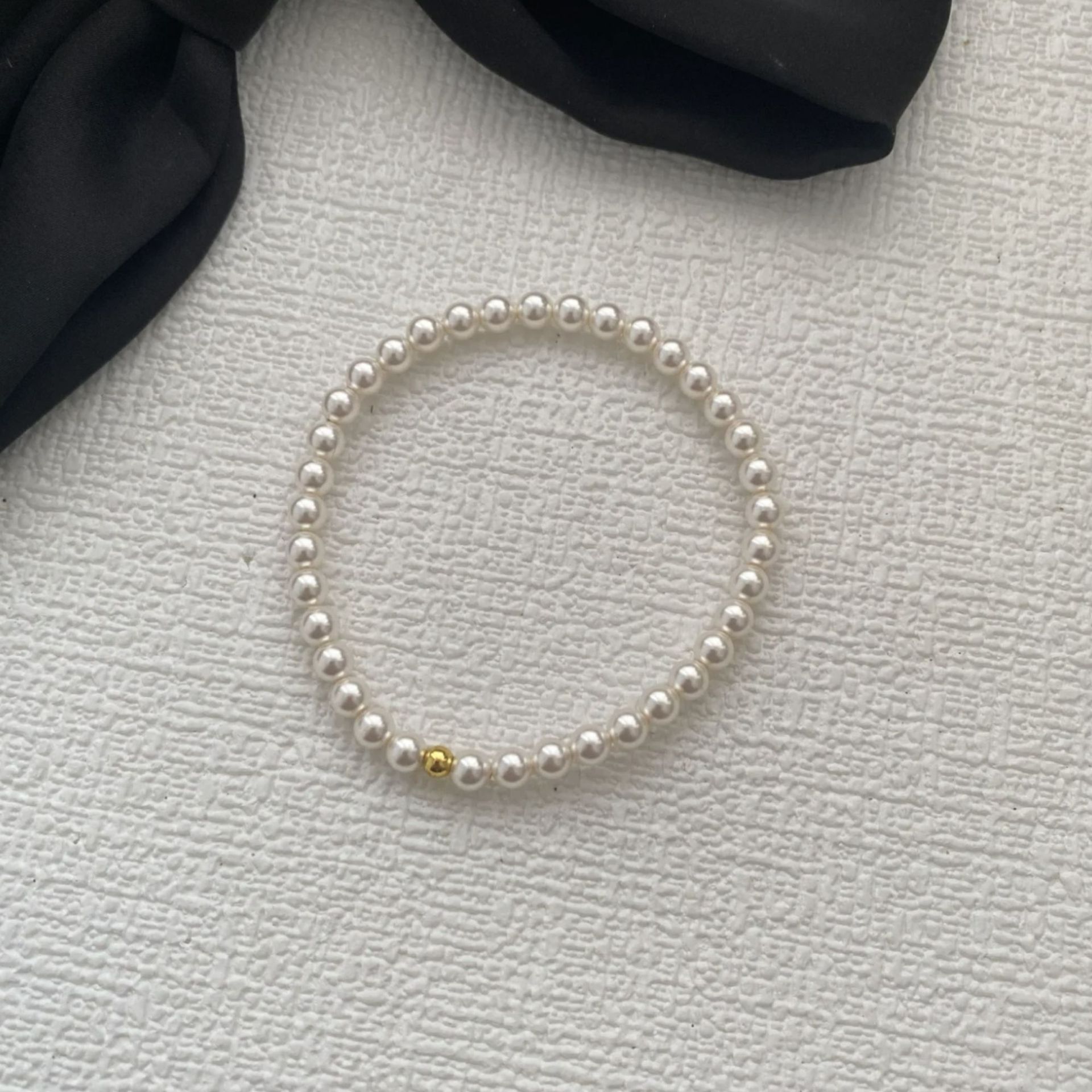 施家珍珠银手镯金珠手链女轻奢小众高级感精致弹力绳手串叠戴手饰