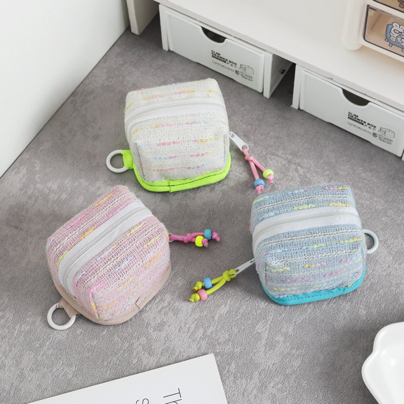 Nuevo mini bolso de llaves de viento de fragancia bolso de cambio lápiz labial de almacenamiento universal para el corazón de la niña conveniente para salir y almacenar en uno