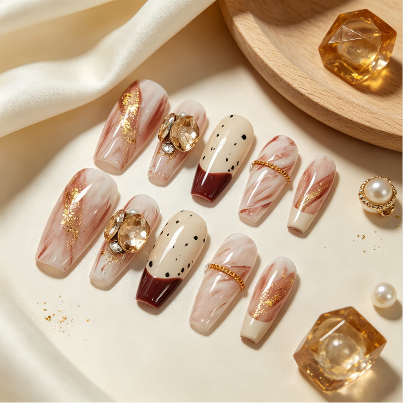 Gradient ribbon with gold accents, French-style rhinestone embellishments, champagne gold press-on nails, nude color, sweet and gentle style, versatile nail art Gradient ribbon with gold accents, French-style rhinestone embellishments, champagne gold press-on nails, nude color, sweet and gentle style, versatile nail art