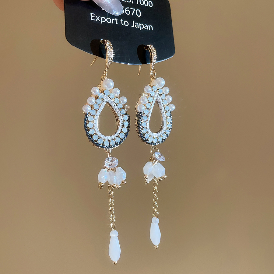 Aguja de plata con diamantes de cristal pendientes de bordilla estilo nacional pendientes de temperamento pequeño ligero lujo de alta calidad industria pesada exageración pendientes