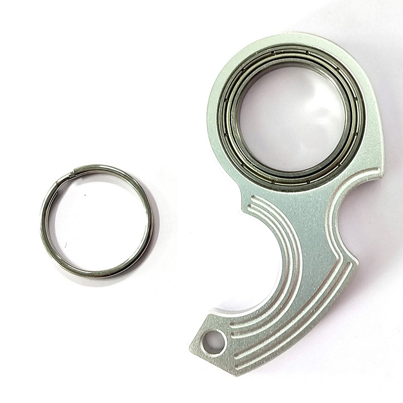 Amazon Venta caliente machete llavero karambit SPINNER descompresión pieza Luz de moda de aluminio giratorio hebilla de metal
