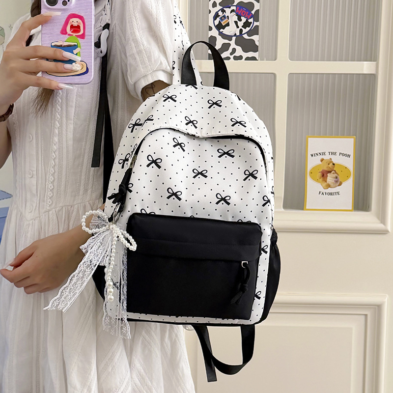 2026 New Vintage Star Print Backpack for Female Students, Large Capacity, Lightweight, Commuting College Style Backpack