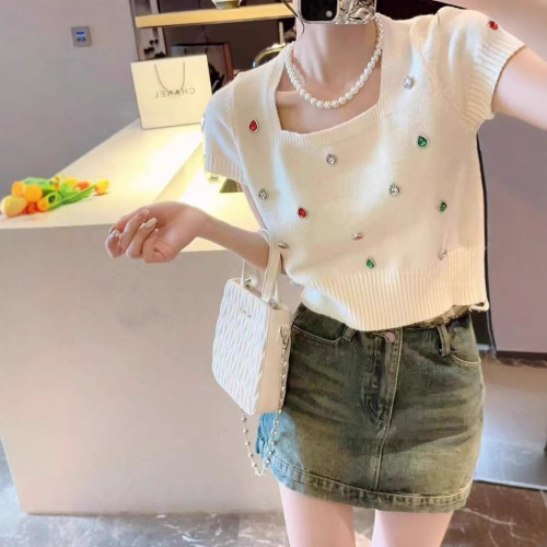 Sleek, sultry, and sweet—this chic, uniquely designed knit short-sleeve T-shirt features a bold square neckline, perfect for summer vibes and effortlessly eye-catching style.