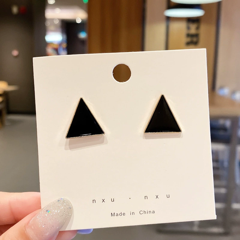 Pearl earrings, small elegant studs, light‑luxury minimalist style