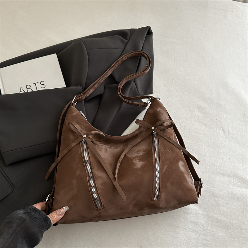 Bolsa de hombro retro suave pitot bolso arco 2025 nueva moda moda coreana bolsa de hombro de gran capacidad casual