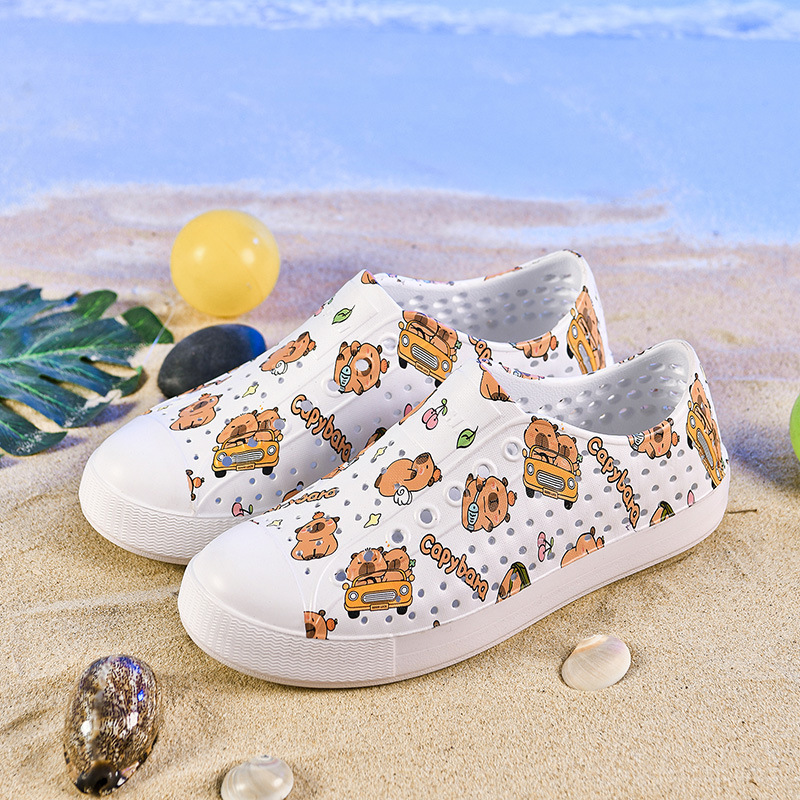 LUCHI zapatos con agujeros pareja verano nuevo estilo graffiti transpirable vadeo hueco hombres y mujeres sandalias de playa casuales en stock