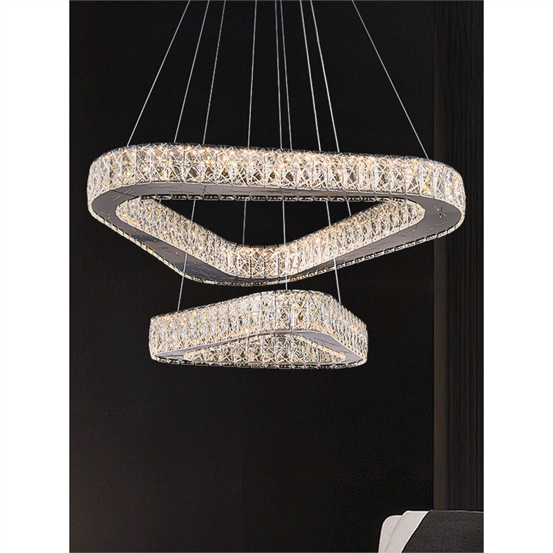 Araña de sala de estar de lujo ligera moderna, diseñador, lámpara de cristal de alta gama, nueva lámpara de comedor de alta gama, lámpara triangular