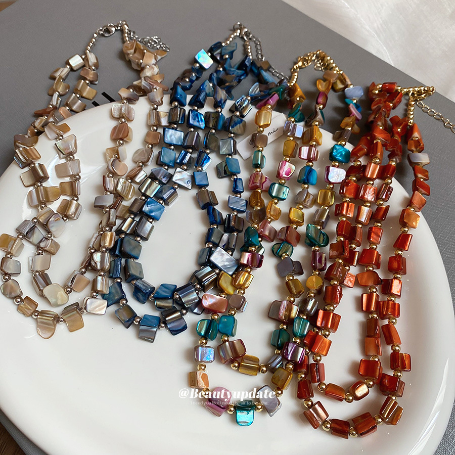 Collar con cuentas de concha de color irregular de verano Cadena de clavícula salvaje retro europea y americana