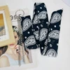 Cashew flower black scarf + silver pants chain