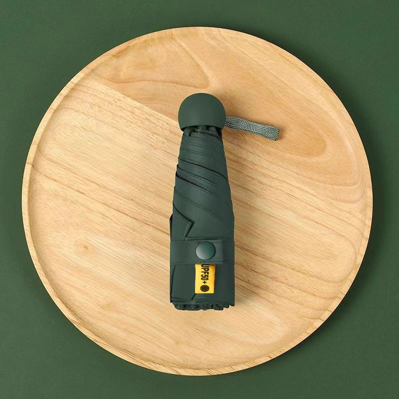 50% de descuento sol y lluvia paraguas de protección solar paraguas de sol UV portátil compacta cápsula sombrilla personalizada